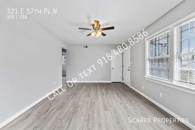Building Photo - 321 E 57th Pl N