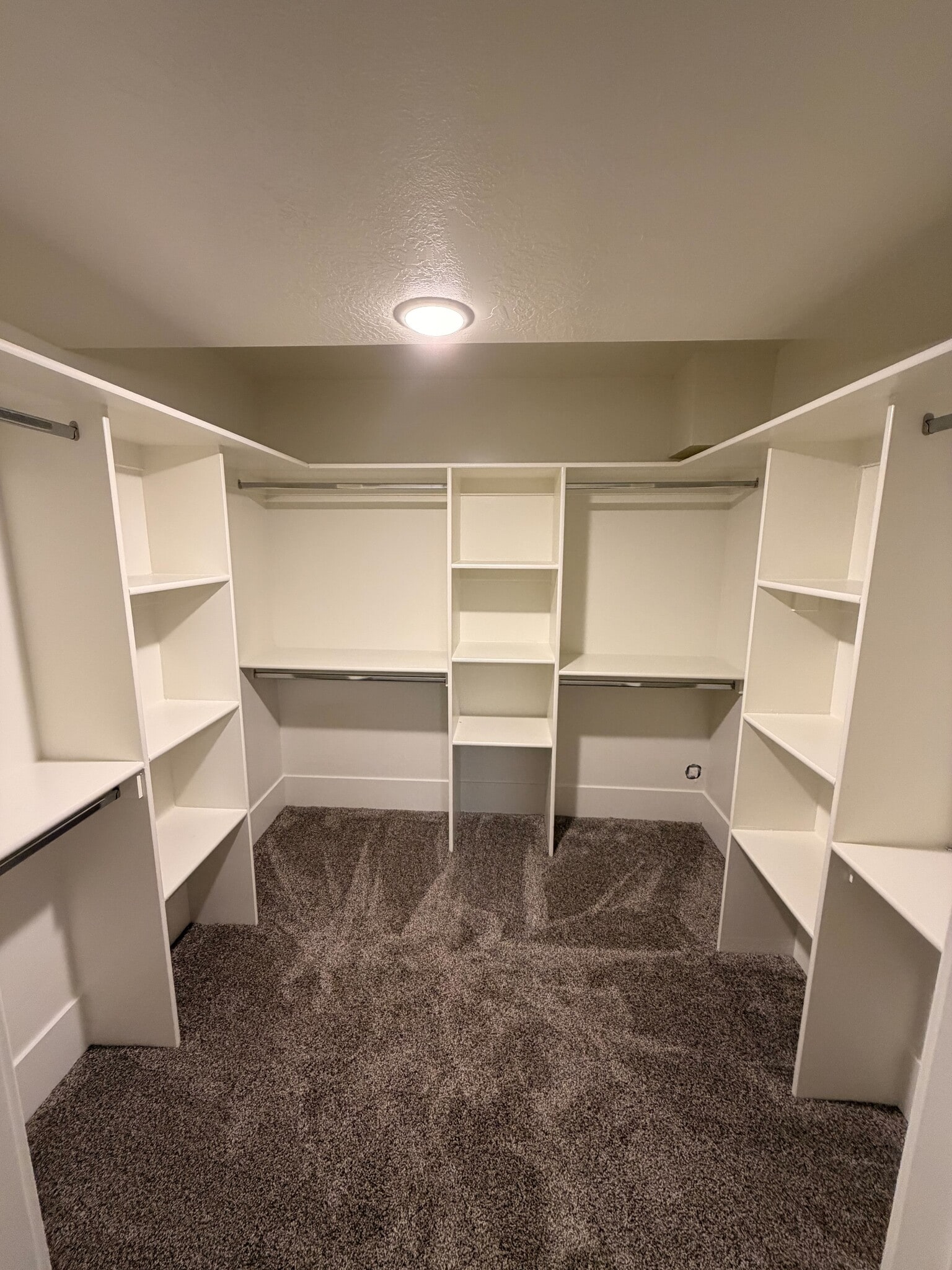 Primary bedroom walk in closet. - 14 N 300 E