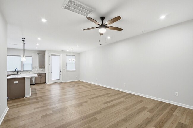 Building Photo - Like-New LoSo Townhome | 3BR + Loft | 2-Car Garage | Move-In Ready