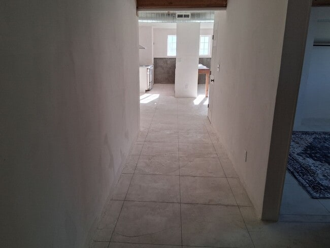 Building Photo - 4 bed, 2 bath, oversize 3 car garage for tradesmen, extra storage. tool trailers