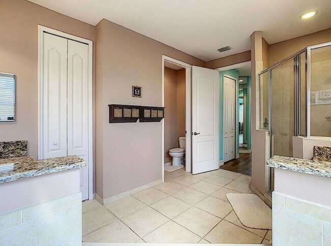 Building Photo - Luxury Living in Woodland Lakes Preserve: Fully-Furnished