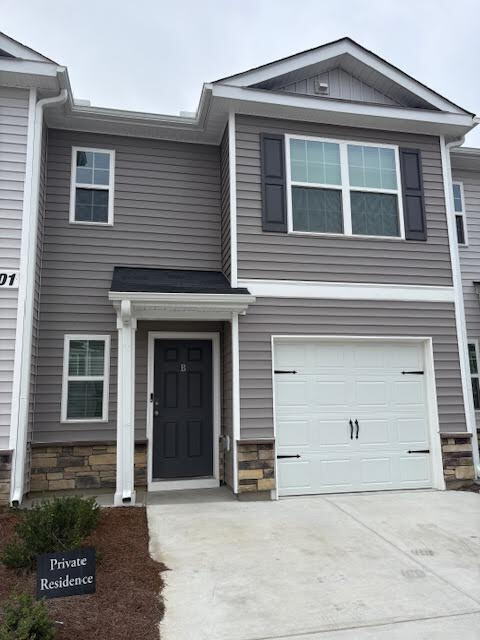 Building Photo - "Charming 3-Bed Townhouse with Granite Ele...