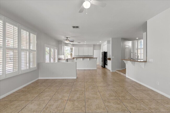 Building Photo - Expansive 4 Bedroom Home with a Pool and L...