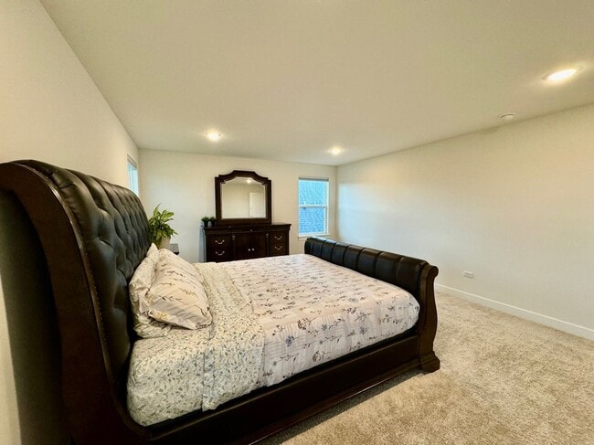 Building Photo - Newly Built 5-bedroom featuring luxe finishes and a spa-inspired master suite.