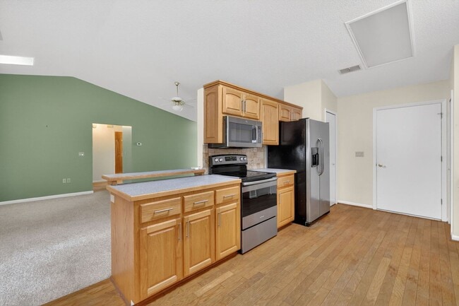 Building Photo - Available Now in Scottish Highlands | 2BR/2BA + Den in Active 55+ Community