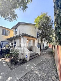Building Photo - Charming 2-Bedroom Home in a Walkable, Bik...