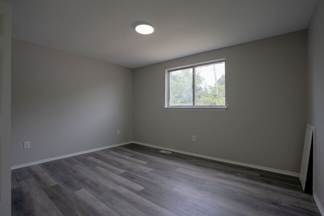 Building Photo - Must see FOUR bedroom Trilevel home