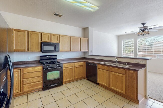 Building Photo - 6512 Los Pueblos Pl NW