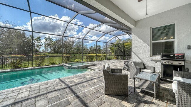 Building Photo - Furnished 4-Bedroom Home with Pool in The Sought After Neighborhood Of Rivo Lakes!!