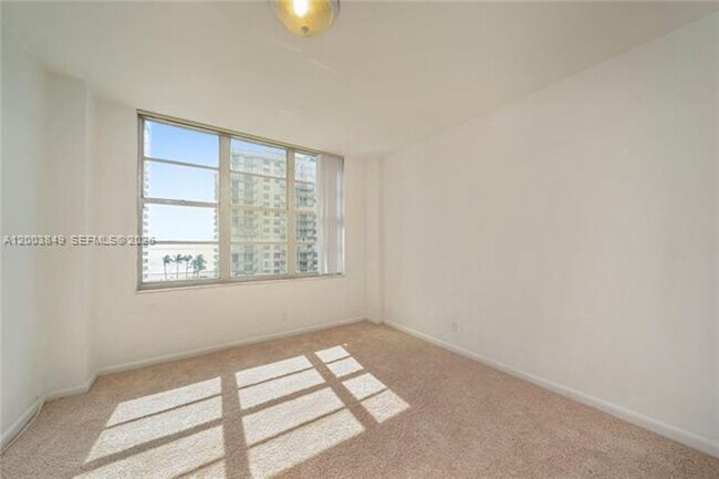 Building Photo - 5700 Collins Ave