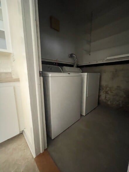 Laundry closet with large storage area - 13 Center St