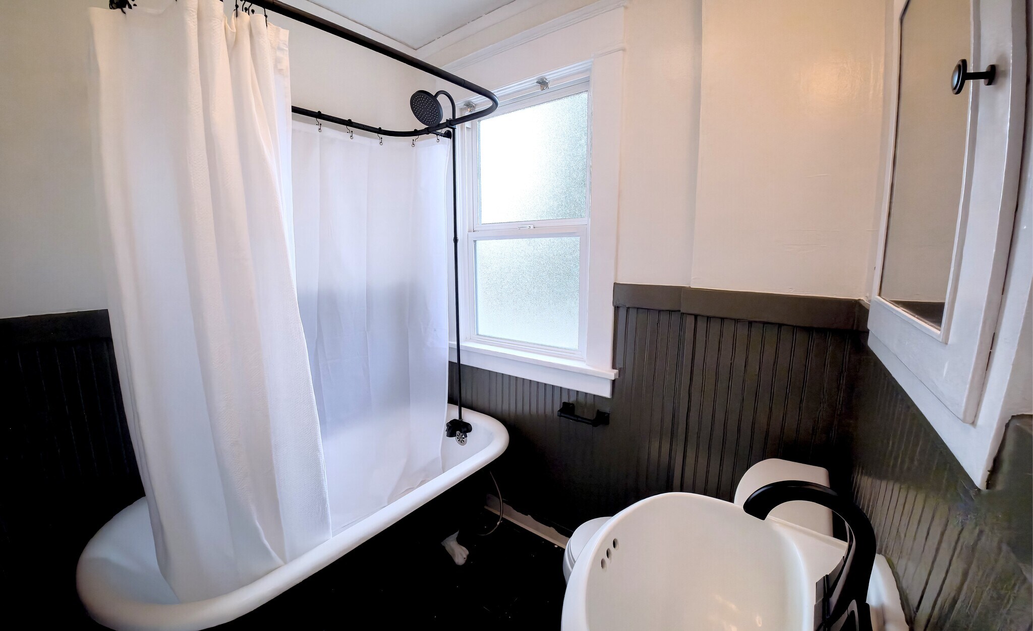 Bathroom with full tub and shower - 621 N Lawrence St