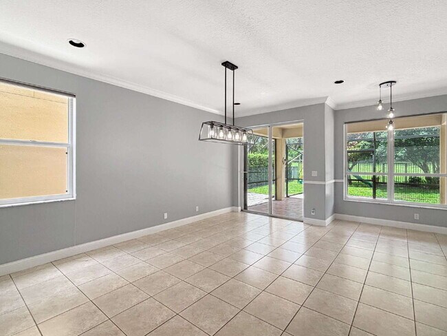 Building Photo - Beautiful 4BR Home in Gated Wellington Shores | Fenced Yard | Resort-Style Amenities