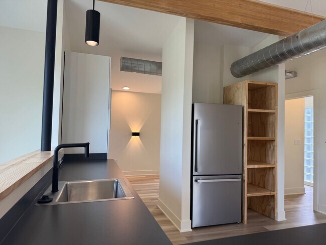 Building Photo - Vaulted Ceilings & Hardwood Floors in This Charming Indianapolis L