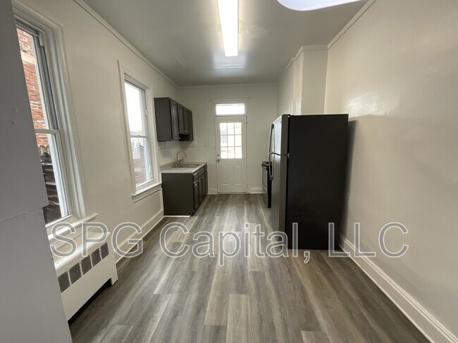 Building Photo - 938 W College Ave