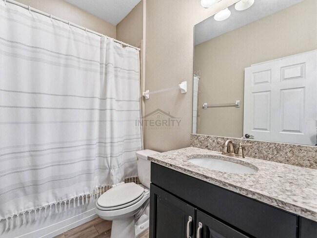Building Photo - 8947 Garden Party Dr