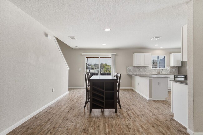 Building Photo - Gated Community Home with Solar Panels & All Appliances Included