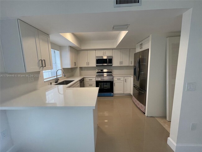 Building Photo - 12370 SW 52nd Pl