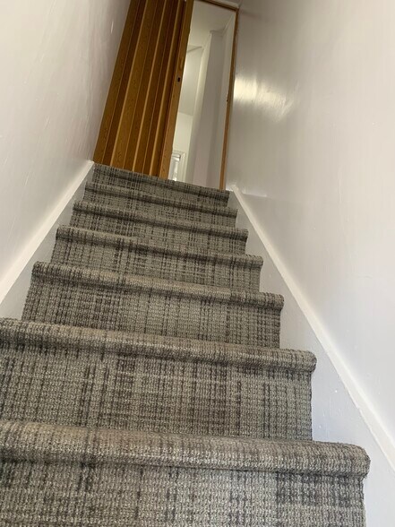 Steps to 2nd level - 307 N 7th St