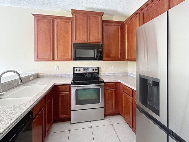 Building Photo - 8528 Sandpiper Ridge Ave