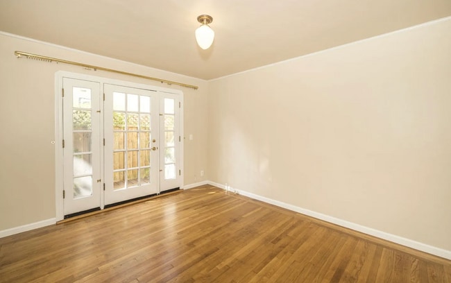 Building Photo - Charming Spanish Style Cottage with Incredible Deck- Gardener's Delight!