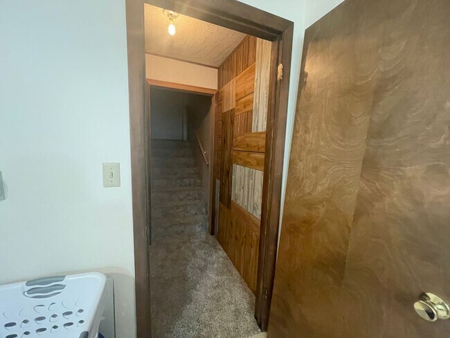 Building Photo - Spacious, four-bedroom, two-bathroom, coun...
