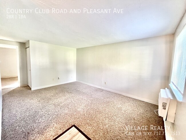 Building Photo - Roomy, remodeled 2-bed w/ on-site laundry ...