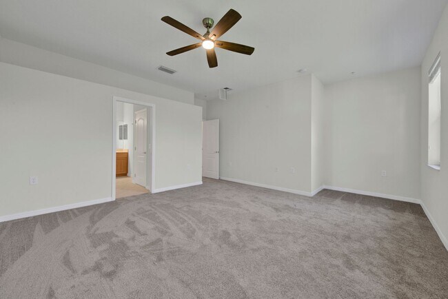 Building Photo - Spacious 3-Bedroom Townhome in the Prestigious Matera Community