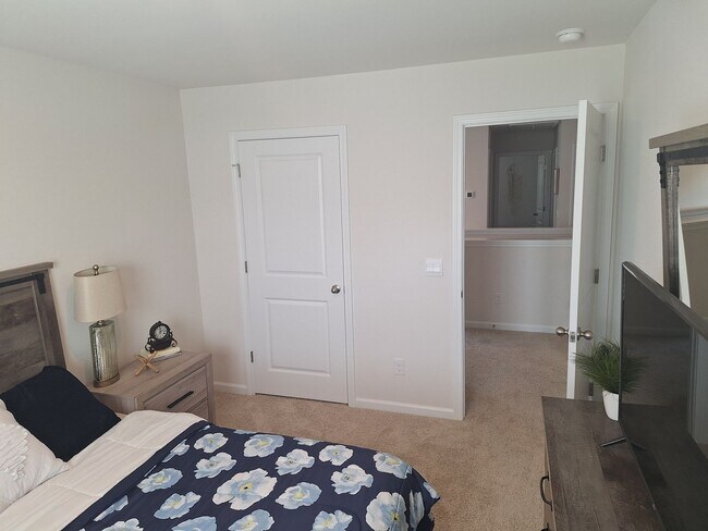Building Photo - Lovely Four Bedroom Home  Appropriately 5 ...