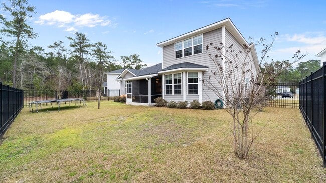 Building Photo - Spacious 6-Bedroom Waterfront Home in Richmond Hill, GA