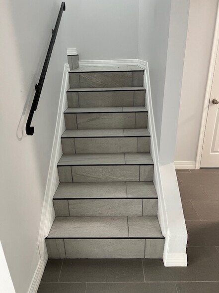 Stairwell New Tile, Grout, Baseboard, Molding, Freshly Painted - 4444 E Belleview St