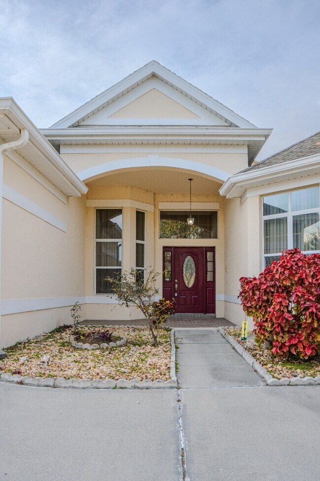 Building Photo - Spacious 5BR Home in Falcon Trace | 3-Car Garage | Screened Patio | Resort-Style Amenities Rent: ...