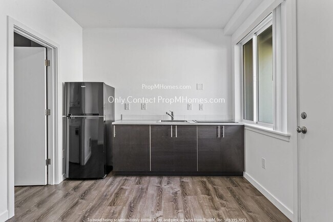 Building Photo - Charming 1BR Condo with Modern Amenities i...