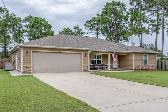 Building Photo - 4 BEDROOMS IN NAVARRE!