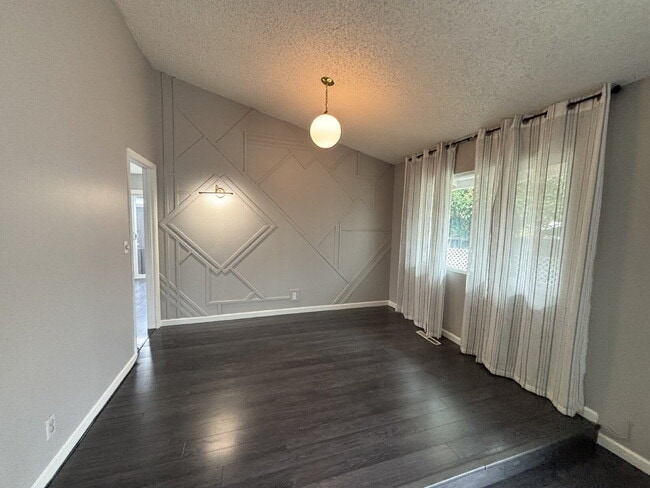 Building Photo - "Charming Concord Retreat: 3-Bedroom Gem with Granite Accents & Cozy Fireplace"