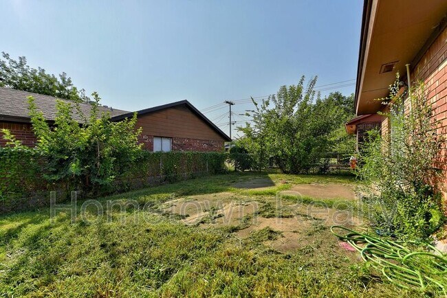 Building Photo - 8616 N Harvey Ave