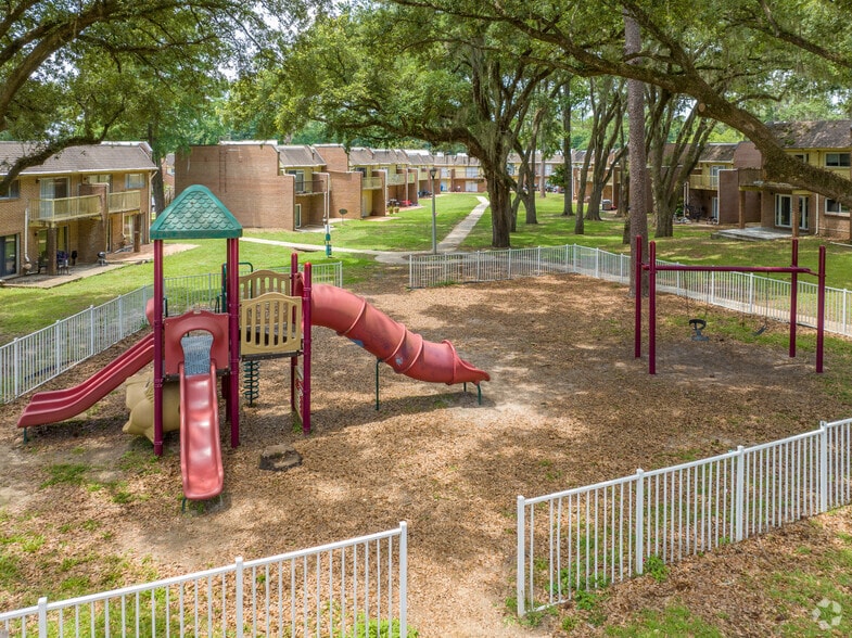 Building Photo - The Residences at Whispering Pines