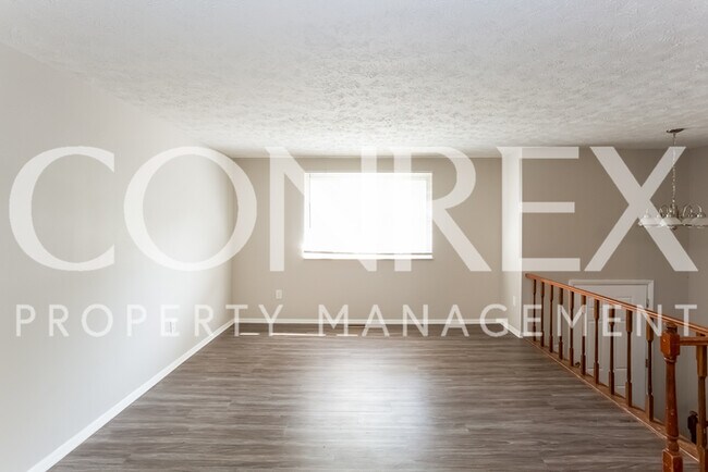 Building Photo - Lovely Tri-Level Home