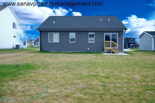 Building Photo - Family-Friendly Ranch Home with 3 Car Gara...