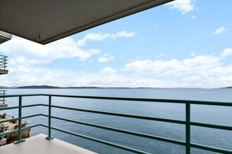 Building Photo - Stunning ALKI WATERFRONT Condo Overlooking Majestic Puget Sound!