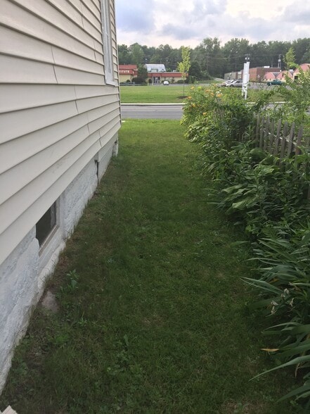 Small side lawn - 129 N Elm St