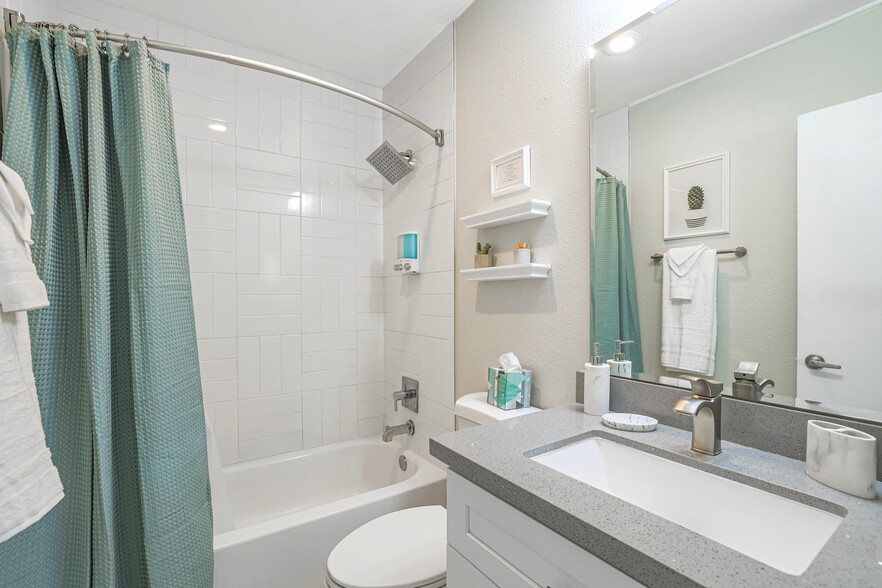 Full bathroom with shower and bathtub - 2821 E Turney Ave