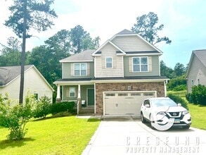 Building Photo - Gated Community 4 BR 2.5 Bath Coming Soon ...