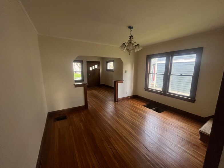 Newly refinished hardwood floors on first floor. - 908 Thomas Rd