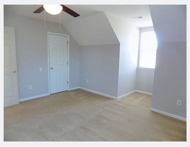 Building Photo - Spacious Condo with Expansive Pond Views