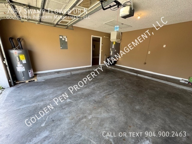 Building Photo - 7057 Swamp Flower Dr N