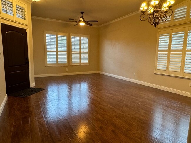 Building Photo - Immaculate home with pool & hardwood floors!