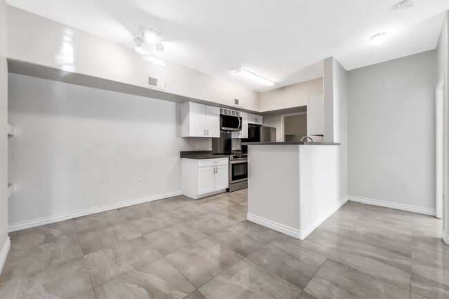 Building Photo - Modern Gated Condo with Upgraded Interior and Attached Garage in Prime South Las Vegas Location!