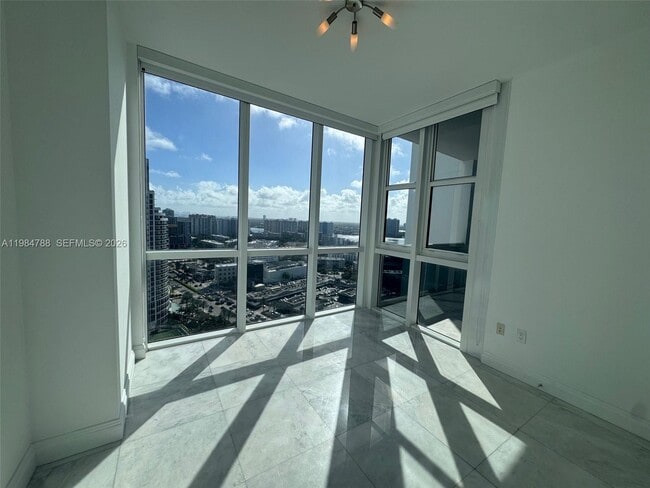 Building Photo - 18201 Collins Ave