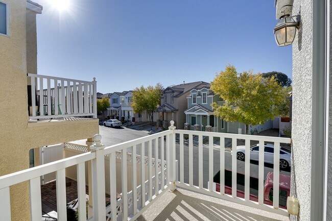 Building Photo - Gated Townhome with Strip Views from the Balcony!